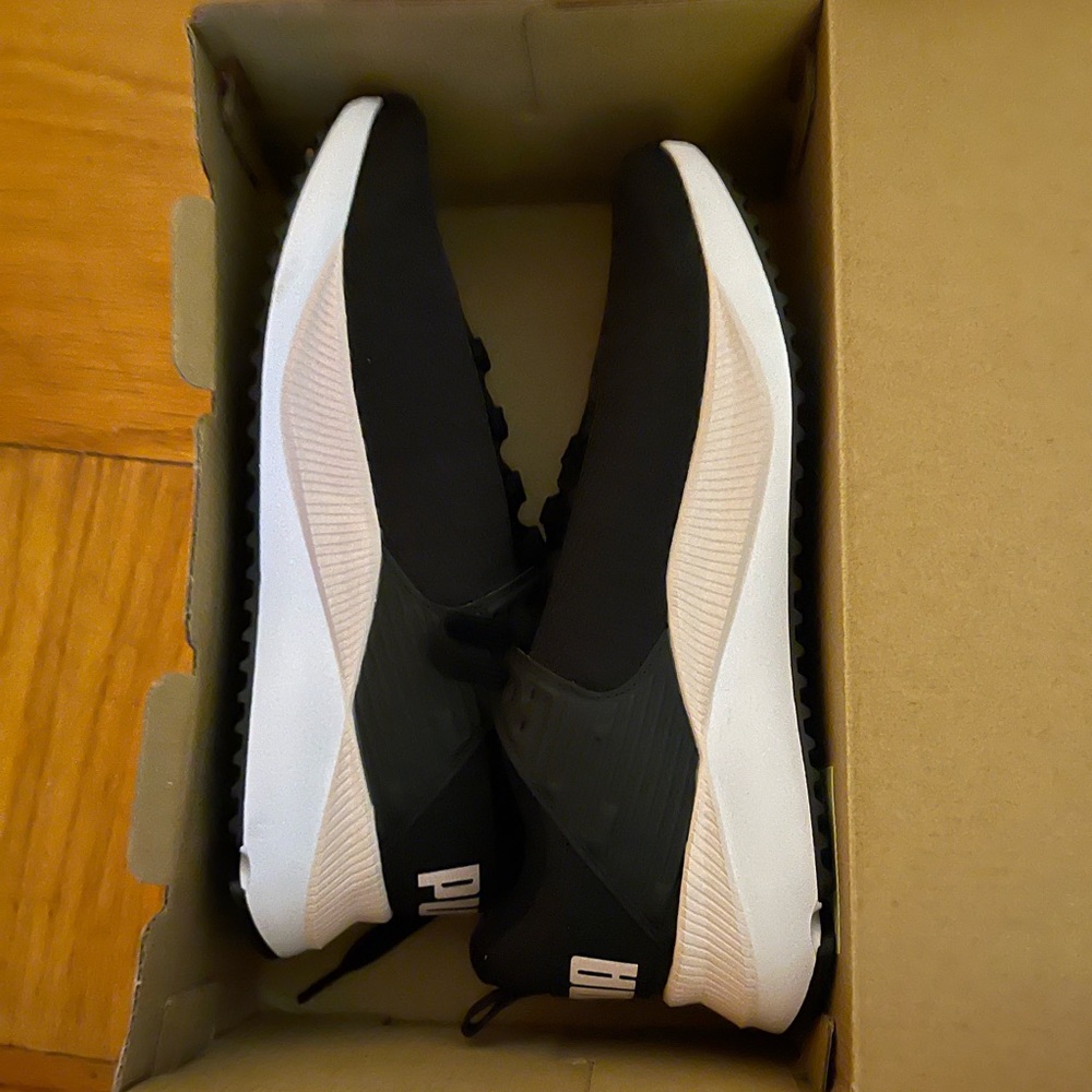 I am selling Puma PC Runner sneakers that are size US 9